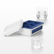 Load image into Gallery viewer, Lifestyle image of OXO Good Grips Covered Silicone Ice Cube Tray - Large Cube.