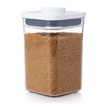 Load image into Gallery viewer, OXO Good Grips Pop Container - Small Square Short, 1040ml, filled with sugar.
