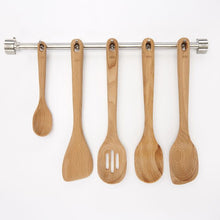 Load image into Gallery viewer, OXO Good Grips Wooden Sauté© Paddle - 32cm on rail with other wooden utensils.