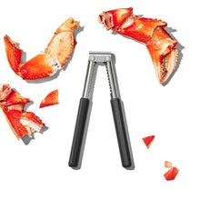 Load image into Gallery viewer, OXO Good Grips Seafood and Nut Cracker - Stainless Steel in use.