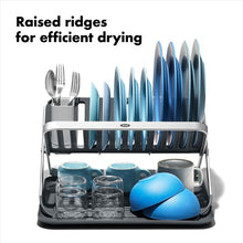 Load image into Gallery viewer, Lifestyle mage of OXO Good Grips Aluminum Fold Flat Dish Rack.