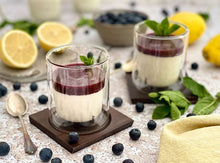 Load image into Gallery viewer, Lifestyle image of Gefu Mira Thermo Glass Set of 2, 253ml, cheesecake.