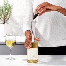 Load image into Gallery viewer, Lifestyle image of OXO Good Grips Expanding Wine Stoppers - Pack of 2.
