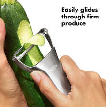 Load image into Gallery viewer, OXO Good Grips Y-Peeler - Stainless Steel, in use.