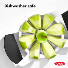 Load image into Gallery viewer, OXO Good Grips Apple Divider / Slicer - White, in use, dishwasher safe.