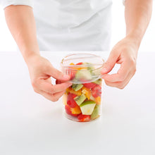 Load image into Gallery viewer, Lekue Reusable Flexible Silicone Lid, 11 - 14cm Diameter - Translucent White