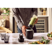Load image into Gallery viewer, Lifestyle image of KitchenAid Go Cordless Mini Blender without Rechargeable Battery - Matt Black.