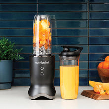 Load image into Gallery viewer, Lifestyle image of Nutribullet Ultra Blender 900 ml, 1200W, With Glow Illuminated Interface.
