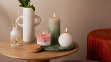 Load image into Gallery viewer, Lifestyle image of Bolsius Shine Rustic Ball Candles Small, Cloudy White - 76mm.