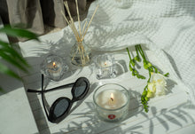 Load image into Gallery viewer, Lifestyle image of Bolsius Pack of 100 Tealight Candles, 3.5-hour Burn Time.