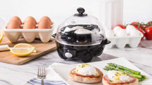 Load image into Gallery viewer, Lifestyle image of Dash Rapid Egg Cooker: 6 Egg Capacity Electric Egg Cooker.