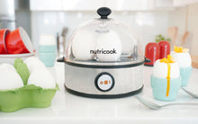 Load image into Gallery viewer, Lifestyle image o Nutricook Rapid Egg Cooker: 7 Egg Capacity with Auto Shut Off Feature, Silver.