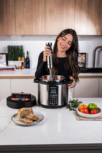Load image into Gallery viewer, Nutricook Handi Immersion Blender, 500ML + 700ML, Black/Stainless Steel. - 1200W, in use.