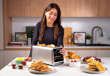 Load image into Gallery viewer, Lifestyle image of Nutricook 4-Slice Smart Toaster With Touch Screen, Stainless Steel - 1450W.