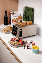 Load image into Gallery viewer, Lifestyle image of Nutricook 4-Slice Smart Toaster With Touch Screen, Stainless Steel - 1450W.