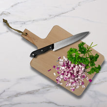 Load image into Gallery viewer, Lifestyle image of Gab Home Wooden Rectangular Chopping Board with Handle - 47 x 28cm.