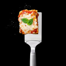 Load image into Gallery viewer, Lifestyle image of OXO Good Grips Lasagna Turner - Stainless Steel.