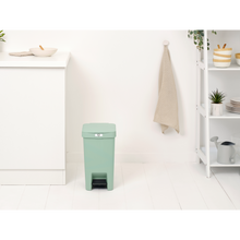 Load image into Gallery viewer, Lifestyle image Brabantia StepUp Pedal Bin from Recycled Plastic - 16 Liters, Jade Green.