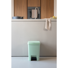 Load image into Gallery viewer, Lifestyle image of Brabantia StepUp Pedal Bin from Recycled Plastic - 25 Liters, Jade Green.