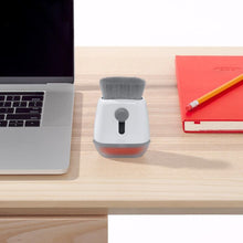 Load image into Gallery viewer, Lifestyle image of OXO Good Grips Sweep & Swipe Laptop Cleaner.