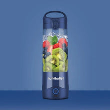 Load image into Gallery viewer, Lifestyle image of Nutribullet Portable Blender with Handled Sip Lid, 475mL - 100W, Navy Blue.