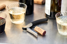Load image into Gallery viewer, Lifestyle image of OXO Good Grips Double Lever Waiter's Corkscrew - Stainless Steel.