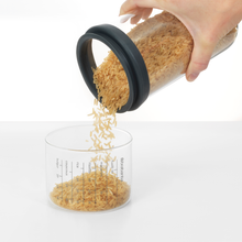 Load image into Gallery viewer, Brabantia Glass Storage Jar with Measuring Cup - 1 Liter, Dark Grey