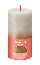 Load image into Gallery viewer, Bolsius Sunset Rustics Medium Rustic Pillar Candle, Sandy Grey + Gold - 130/68mm with label.
