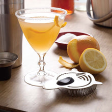 Load image into Gallery viewer, Lifestyle image ofOXO Good Grips Steel Cocktail Strainer - Stainless Steel.
