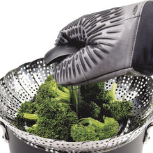 Load image into Gallery viewer, OXO Good Grips Pop-Up Steamer with Extendable Handle - Stainless Steel, 28cm, in use.
