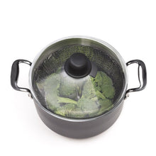 Load image into Gallery viewer, OXO Good Grips Pop-Up Steamer with Extendable Handle - Stainless Steel, 28cm, in use in pot.
