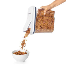 Load image into Gallery viewer, OXO Good Grips Pop Medium Cereal Dispenser - 3.21 Liters, in use.
