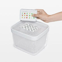 Load image into Gallery viewer, OXO Good Grips Greensaver Carbon Filter Refills - Pack of 4, in container.
