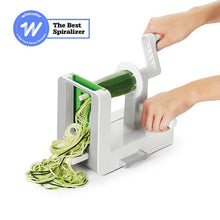 Load image into Gallery viewer, OXO Good Grips Tabletop Spiralizer - White, in use with zucchini.
