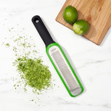 Load image into Gallery viewer, Lifestyle image of OXO Good Grips Etched Zester - Green.
