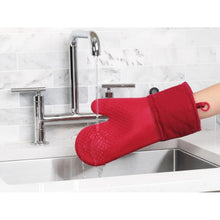 Load image into Gallery viewer, Lifestyle image of OXO Good Grips Silicone Oven Mitt - Red.
