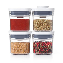 Load image into Gallery viewer, OXO Good Grips Pop Mini Container Set of 4 Pieces - 190ml, filled with seeds and grains.
