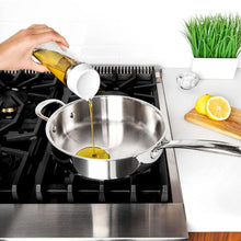 Load image into Gallery viewer, OXO Good Grips Precision Pour Glass Dispenser - 355ml, in use.
