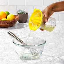 Load image into Gallery viewer, Lifestyle image of OXO Good Grips 2-in-1 Citrus Juicer - 350ml.
