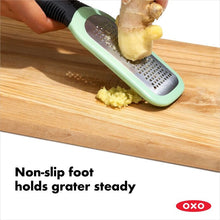 Load image into Gallery viewer, OXO Good Grips Etched Ginger &amp; Garlic Grater - Mint Green, non-slip foot.
