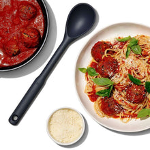 Load image into Gallery viewer, Lifestyle image of OXO Good Grips Silicone Spoon - Peppercorn.

