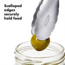 Load image into Gallery viewer, OXO Good Grips Mini Tongs - Stainless Steel, in use.
