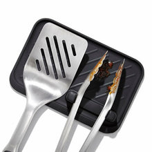 Load image into Gallery viewer, OXO Good Grips Grilling Turner &amp; Tong Set - Stainless Steel, in use.
