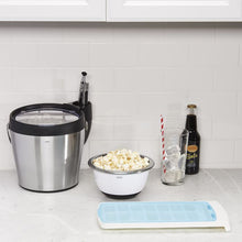 Load image into Gallery viewer, Lifestyle image of OXO Good Grips No-Spill Ice Cube Tray.
