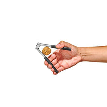 Load image into Gallery viewer, OXO Good Grips Seafood and Nut Cracker - Stainless Steel, in use with walnut.
