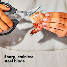 Load image into Gallery viewer, OXO Good Grips Seafood Scissors, in use.
