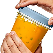 Load image into Gallery viewer, OXO Good Grips Twist &amp; Stack Container, Pack of 2 - 946ml, in use.
