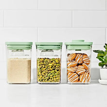 Load image into Gallery viewer, Lifestyle image OXO Good Grips Pop Container Set with Mini Scoops - Limited Edition Pistachio, Set of 3.
