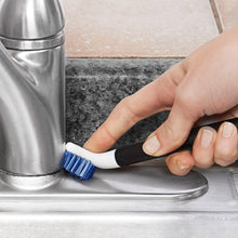 Load image into Gallery viewer, OXO Good Grips Kitchen Detail Cleaning Brush Set - White/Blue, in use on sink.
