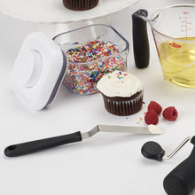 Load image into Gallery viewer, Lifestyle image of OXO Good Grips Cupcake Icing Knife - 22cm.
